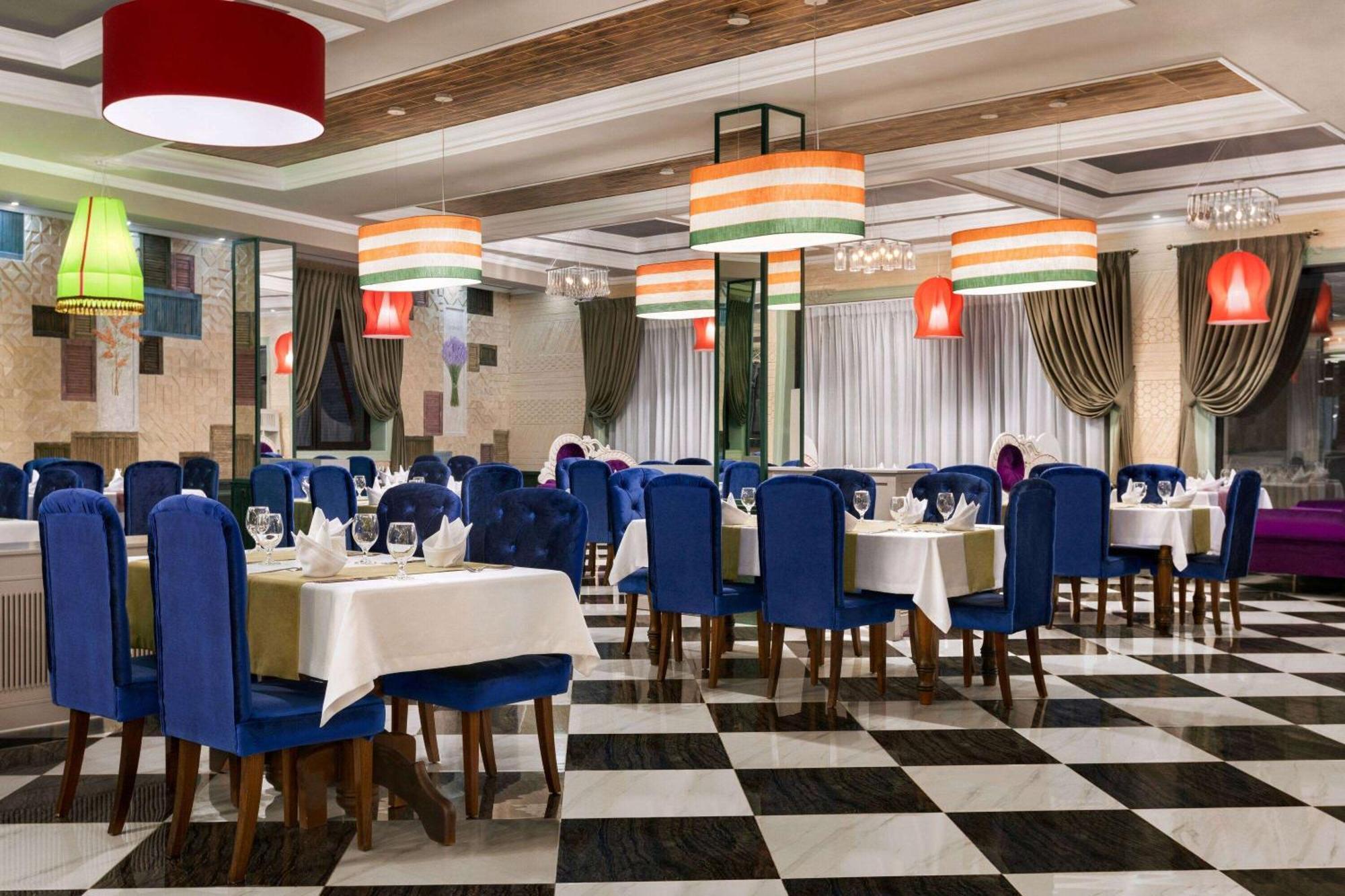 Ramada By Wyndham Shymkent Hotel Bagian luar foto
